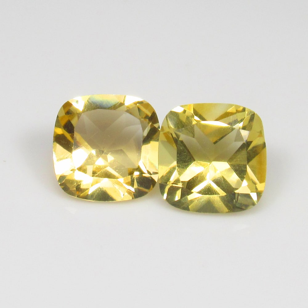 2.74 Ct Natural Yellow Citrine Cushion Cut Pair: Weight - 2.74 Ct / Size - 7.20 x 7.10 x 4.20 mm / 2 Pc's / Shape - Cushion Cut / Color - Yellow / Clarity - VVS / Origin - Brazil / Treatment - Heated