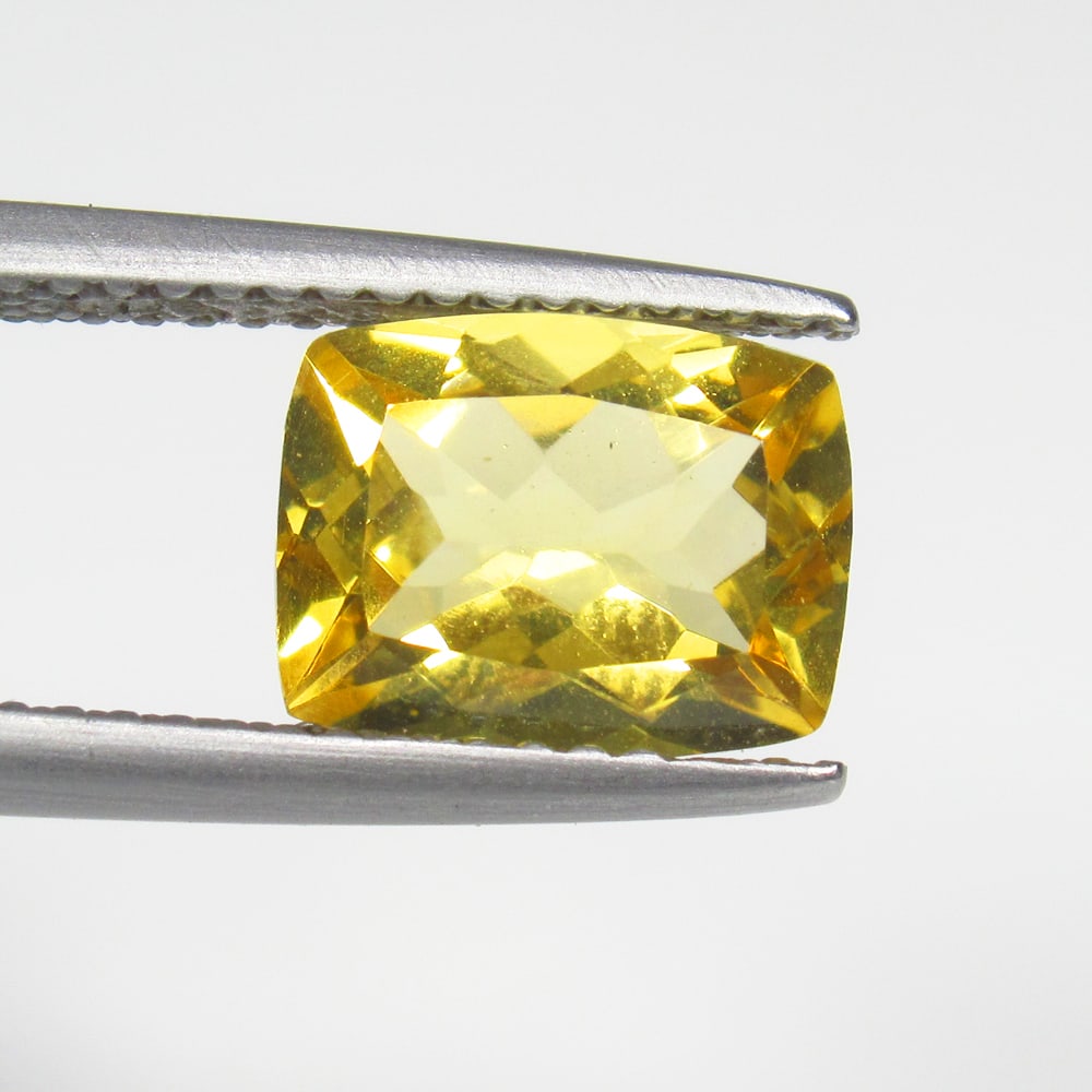 2.07 Ct Natural Yellow Citrine Cushion Cut: Weight - 2.07 Ct / Size - 9.10 x 7.20 x 4.90 mm / Shape - Cushion Cut / Color - Yellow / Clarity - VVS / Origin - Brazil / Treatment - Heated