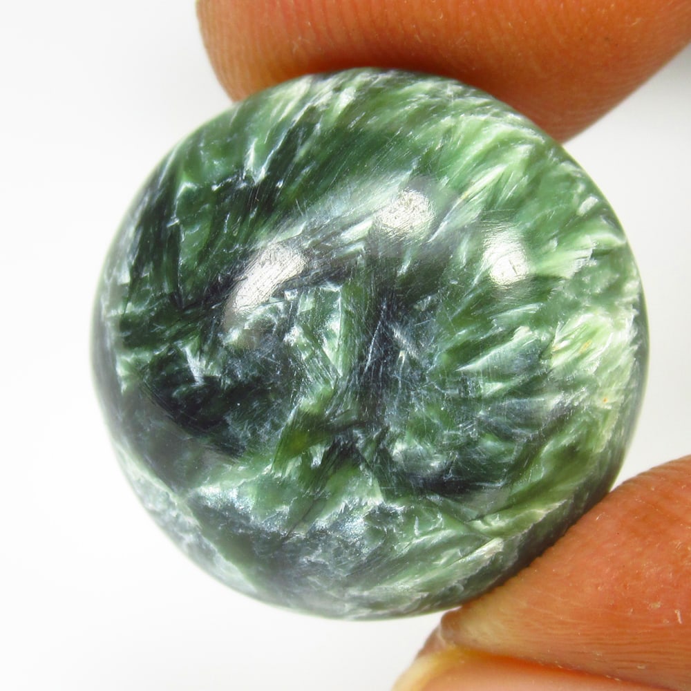 13.51 Ct Natural Serphinite Round Cab: Weight - 13.51 Ct / Dimensions -16.70 x 16.70 x 6.50 mm / Shape - Round Cab / Color - Green / Clarity - Opaque / Origin - Brazil / Treatment - None