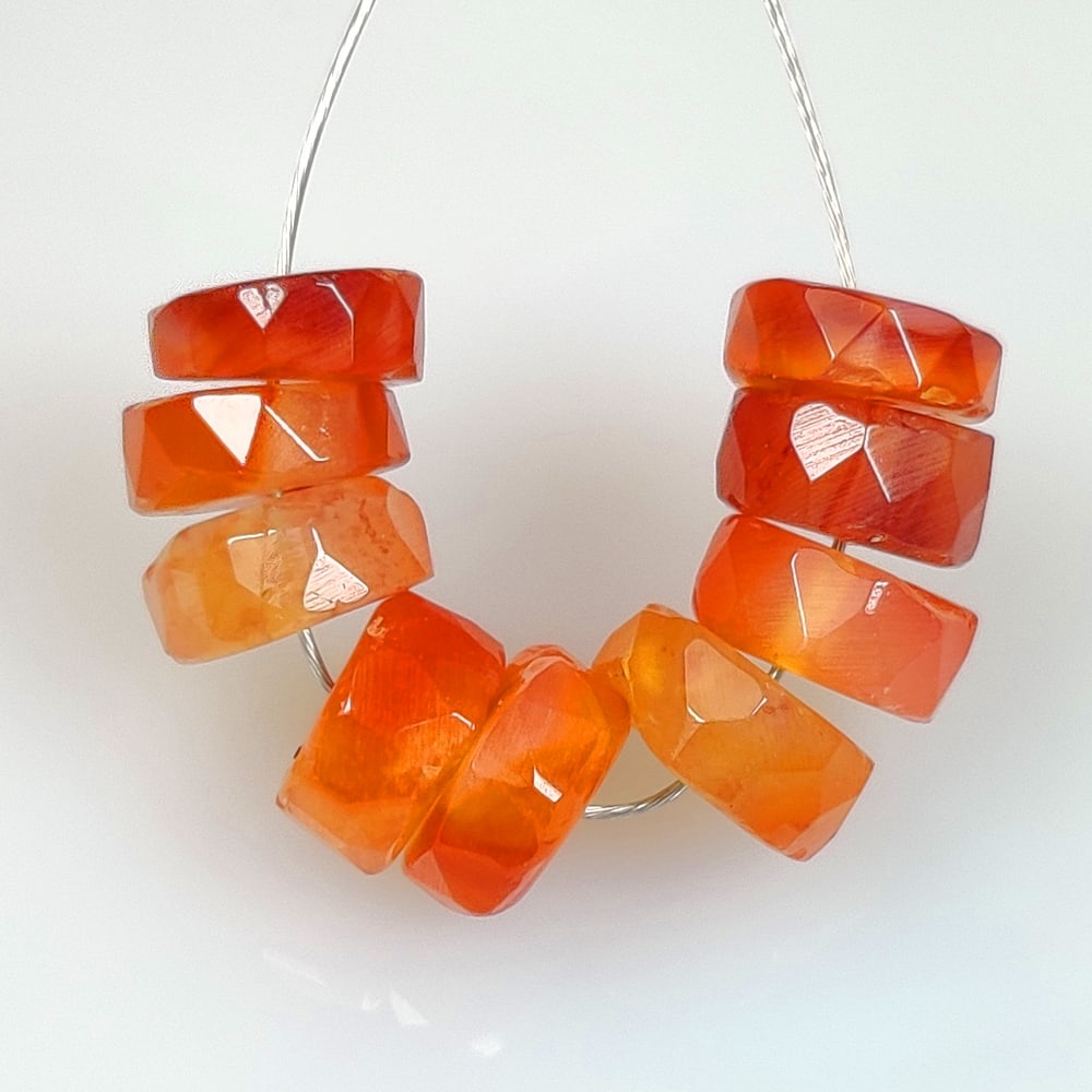10.40 Ct Natural Orange Carnelian Round Cut Beads: Weight - 10.40 Ct / Dimensions - 6.60 - 7.20 mm / 9 Pc's / Shape & Cut - Round Cut Beads / Transparency - Semi - Opaque / Origin - Brazil