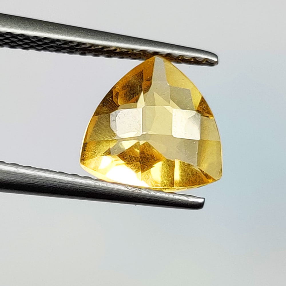 2.16 Ct Natural Yellow Citrine Trillion Cut: Weight - 2.16 Ct / Dimensions - 9.40 x 9.30 x 5.10 mm / Shape - Trillion Cut / Color - Yellow / Clarity - VVS / Origin - Brazil / Treatment - Heated