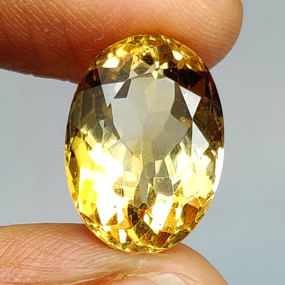 7.18 Ct Natural Yellow Citrine Oval Cut: Weight - 7.18 Ct / Dimensions - 14.10 x 10.10 x 8.20 mm / Shape - Oval Cut / Color - Yellow / Clarity - VVS / Origin - Brazil / Treatment - Heated