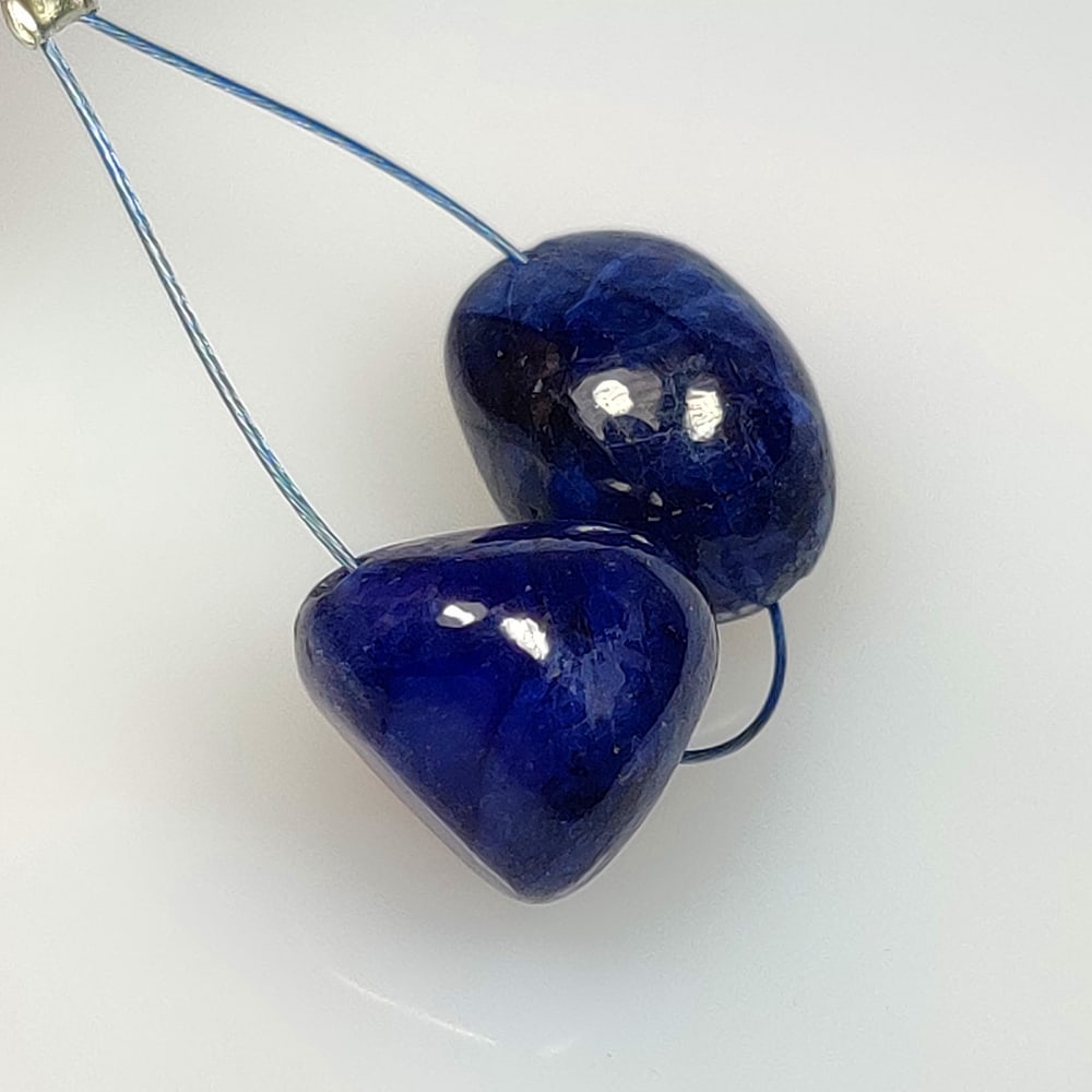 15.39 Ct Natural Blue Sapphire Dumble Beads: Weight - 15.39 Ct / Size- 8.6x4.2 - 9.2x4.6 mm / 2 Pc's / Shape - Dumble Beads / Clarity - VVS / Origin - Sri Lanka / Treatment - Standard Heated