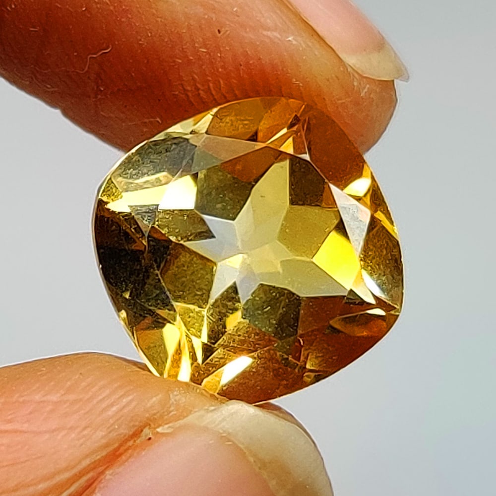 4.04 Ct Natural Yellow Citrine Cushion Cut: Weight - 4.04 Ct / Dimensions - 10.20 x 10.20 x 6.70 mm / Shape - Cushion Cut / Color - Yellow / Clarity - VVS / Origin - Brazil / Treatment - Heated