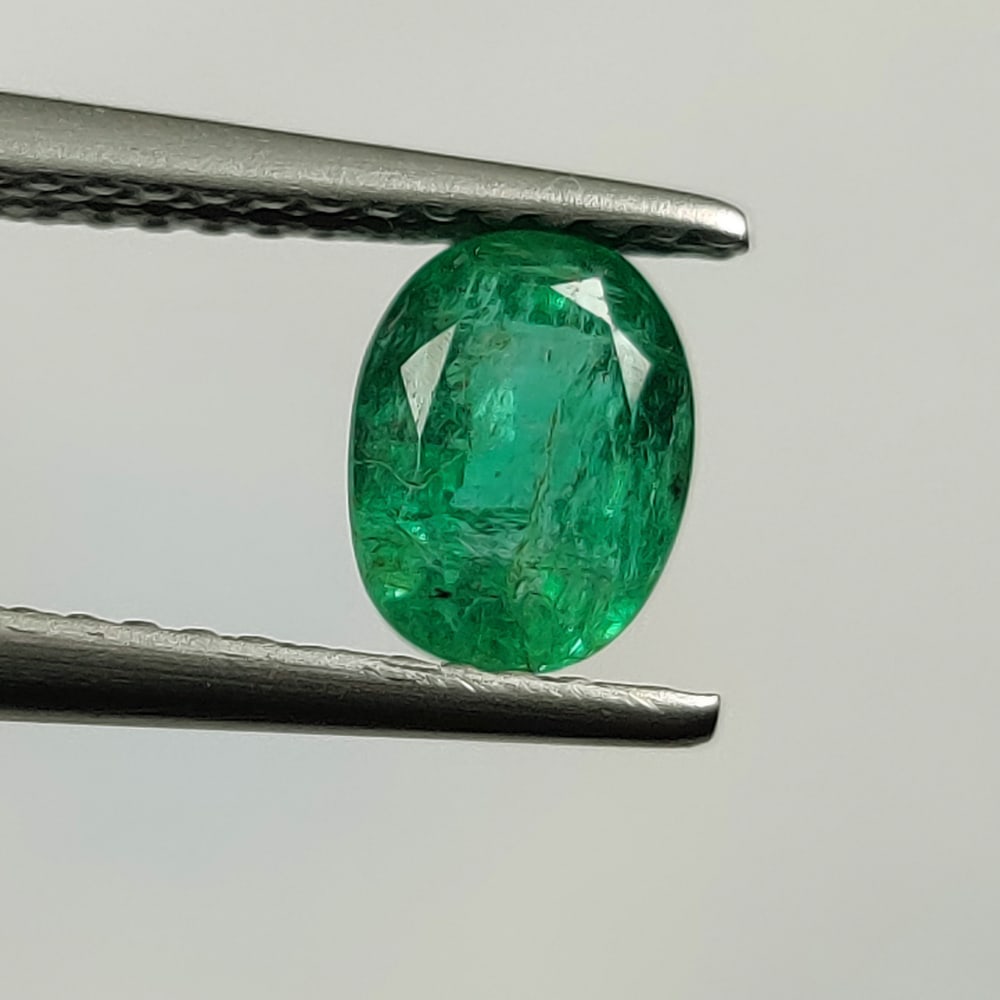 1.04 Ct Natural Zambian Green Emerald Oval Cut: Weight - 1.04 Ct / Size - 6.90 x 5.20 x 4.40 mm / Shape - Oval Cut / Color - Green / Clarity - SI / Origin - Zambia / Treatment - Natural Emeralds are commonly enhanced by oil