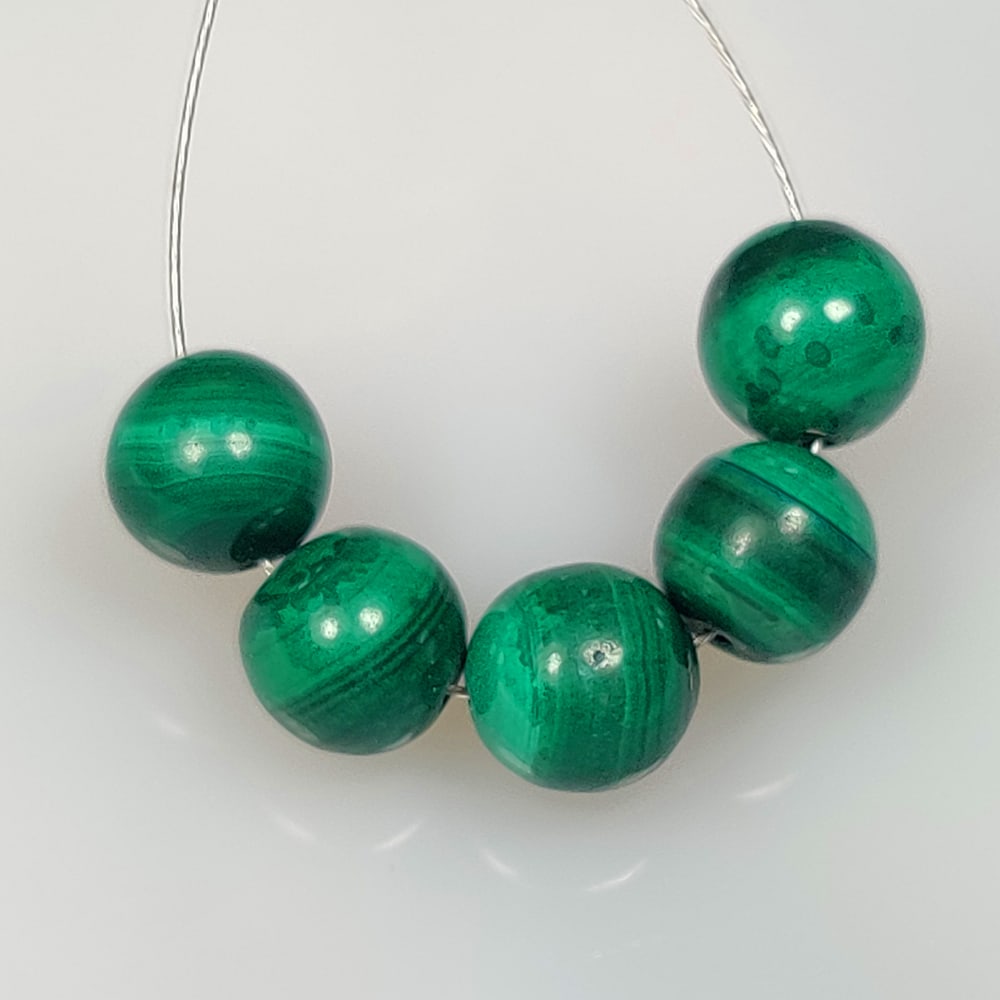 14.55 Ct Natural Green Malachite Round Ball Beads: Weight - 14.55 Ct / Size - 6.50 - 6.90 mm / 5 Pc's / Shape - Round Ball Beads / Color - Green / Clarity - Opaque / Origin - Russia / Treatment - None