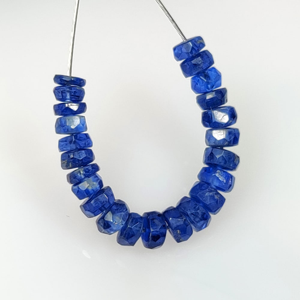 5.85 Ct Natural Blue Sapphire Round Cut Beads: Weight - 5.85 Ct / Size- 3.30 - 3.90 mm / 23 Pc's / Shape - Round Cut Beads / Clarity - VVS / Origin - Sri Lanka / Treatment - Standard Heated