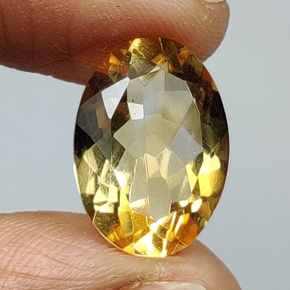 4.42 Ct Natural Yellow Citrine Oval Cut: Weight - 4.42 Ct / Size - 13.70 x 9.70 x 6.00 mm / Shape - Oval Cut / Color - Yellow / Clarity - VVS / Origin - Brazil / Treatment - Heated