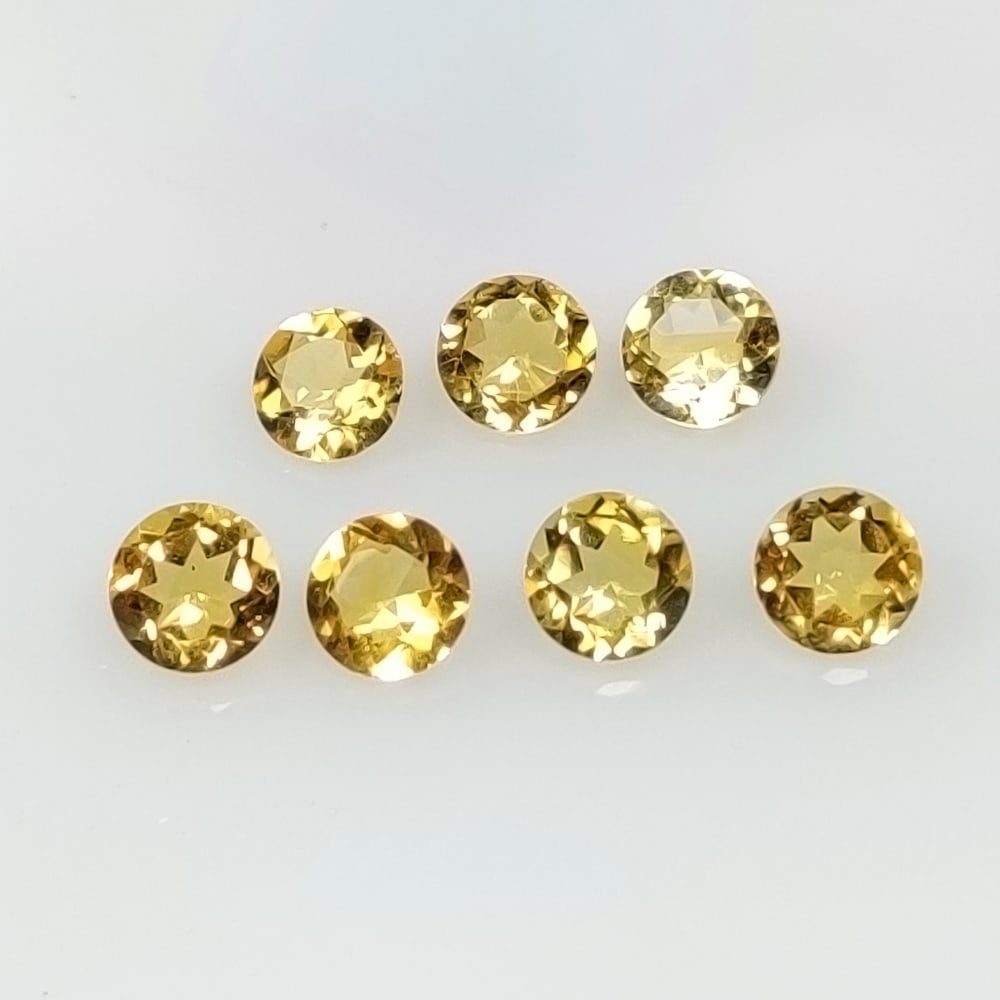3.11 Ct Natural Yellow Citrine Round Cut Set: Weight - 3.11 Ct / Size -5.10 - 5.20 mm / 7 Pc's / Shape - Round Cut / Color - Yellow / Clarity - VVS / Origin - Brazil / Treatment - Heated