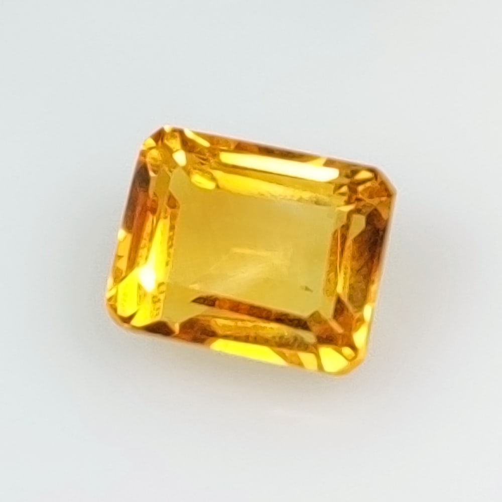 5.33 Ct Natural Yellow Citrine Emerald Cut: Weight - 5.23 Ct / Size -10.80 x 8.60 x 6.80 mm / Shape - Emerald Cut / Color - Yellow / Clarity - VVS / Origin - Brazil / Treatment - Heated