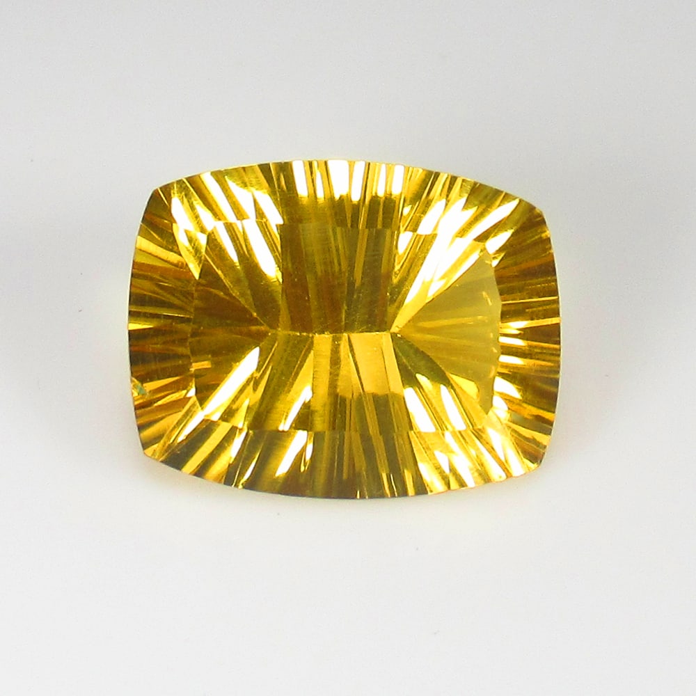 11.53 Ct Natural Yellow Citrine Cushion Concave cut: Weight - 11.53 Ct / Size - 16.70 x 13.00 x 8.60 mm / Shape - Cushion Cut / Color - Yellow / Clarity - VVS / Origin - Brazil / Treatment - Heated