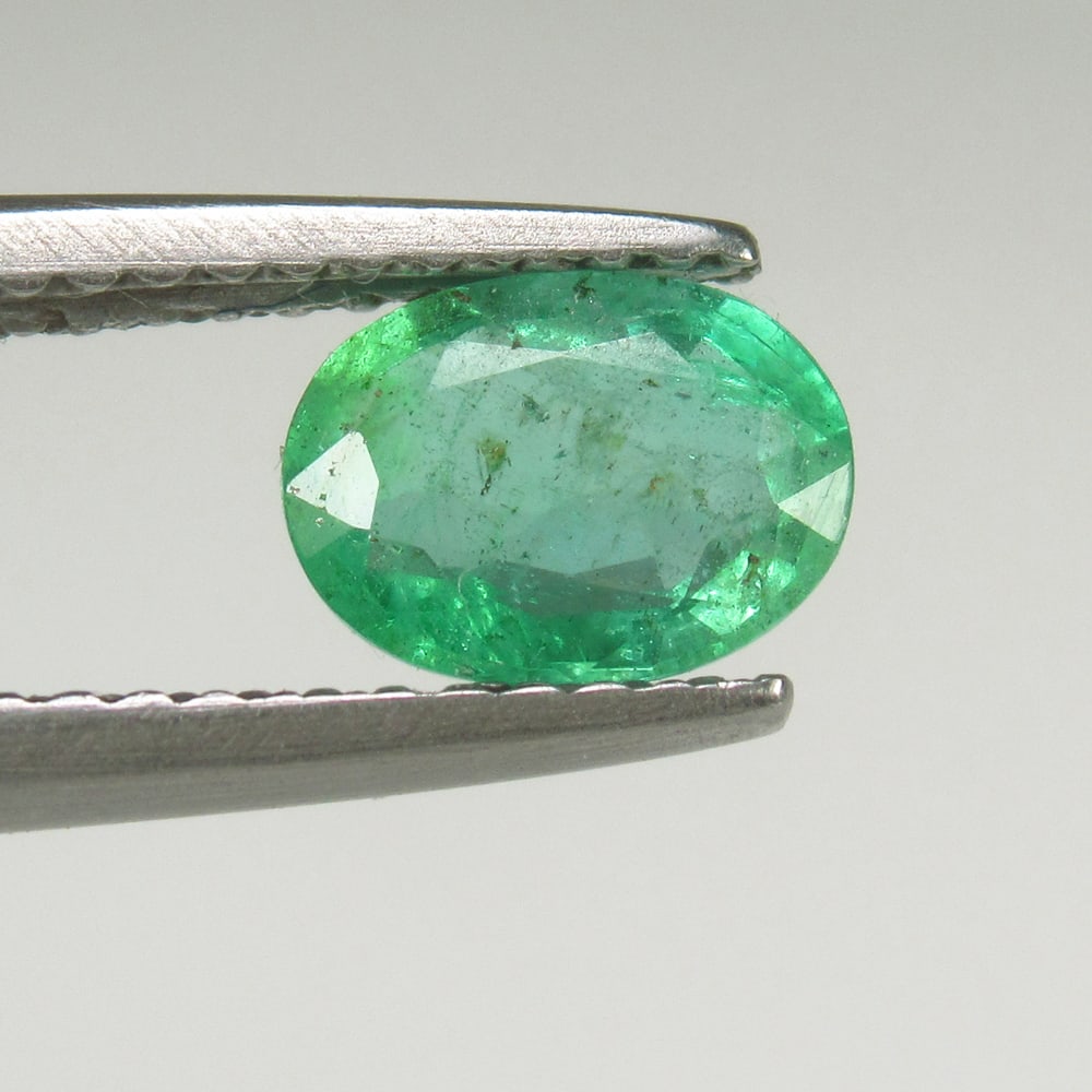 0.83 Ct Natural Zambian Green Emerald Oval Cut: Weight - 0.83 Ct / Size - 7.00 x 5.00 x 3.00 mm / Shape - Oval Cut / Color - Green / Clarity - SI / Origin - Zambia / Treatment - Natural Emeralds are commonly enhanced by oil