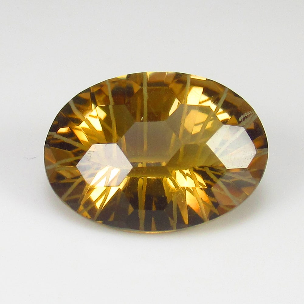 8.48 Ct Natural Honey Quartz Oval Cut: Weight - 8.48 Ct / Size -16.50 x 12.00 x 8.30 mm / Shape - Oval Football Cut / Color - Yellow Color / Clarity - VVS / Origin - Brazil / Treatment - None