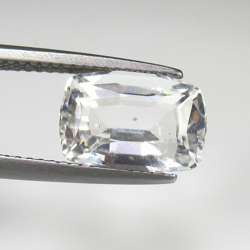 3.59 Ct Natural Colorless Topaz Cushion Cut: Weight - 3.59 Ct / Size - 11.60 x 8.00 x 6.00 mm / Shape - Cushion Cut / Color - White / Clarity - VVS / Origin - Brazil / Treatment - None