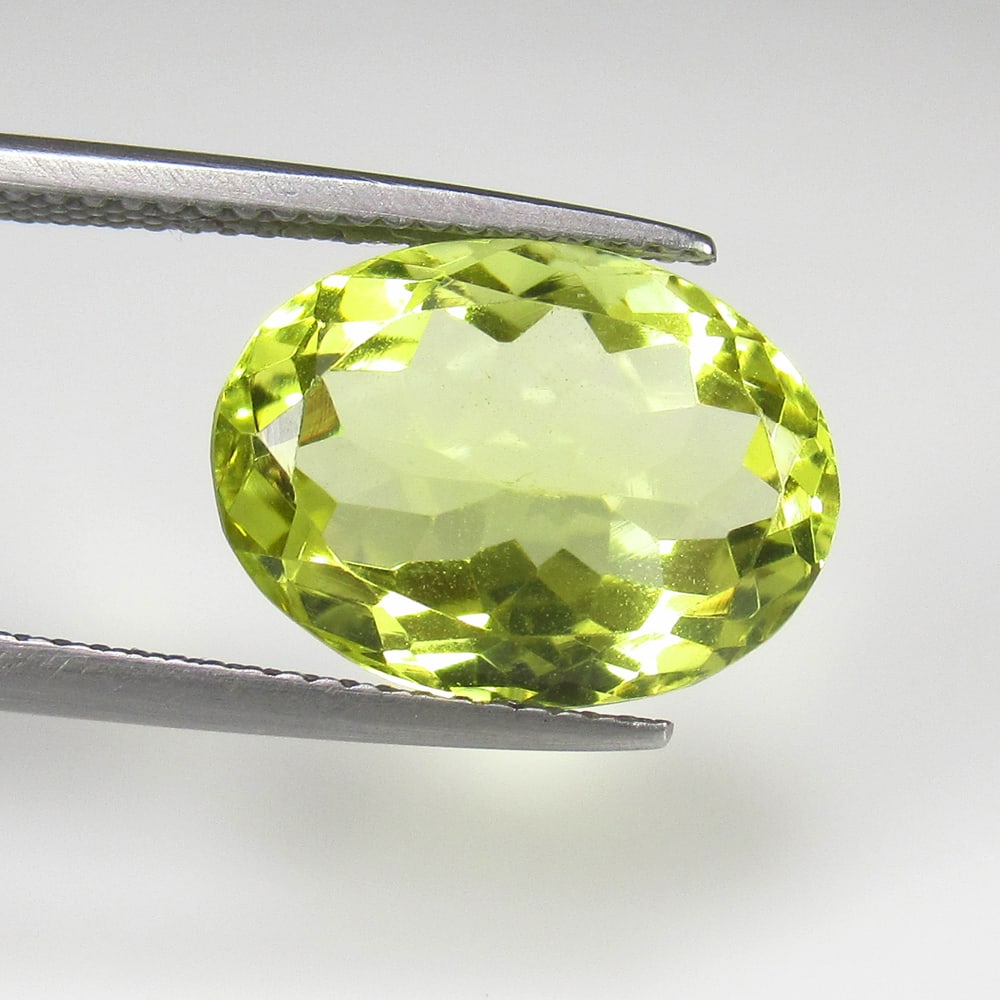 6.79 Ct Natural Lemon Quartz Oval Cut: Weight - 6.79 Ct / Size - 14.20 x 10.50 x 6.80 mm / Top Quality Luster / Excellent Oval Cut / Origin - Brazil / Treatment - Heated