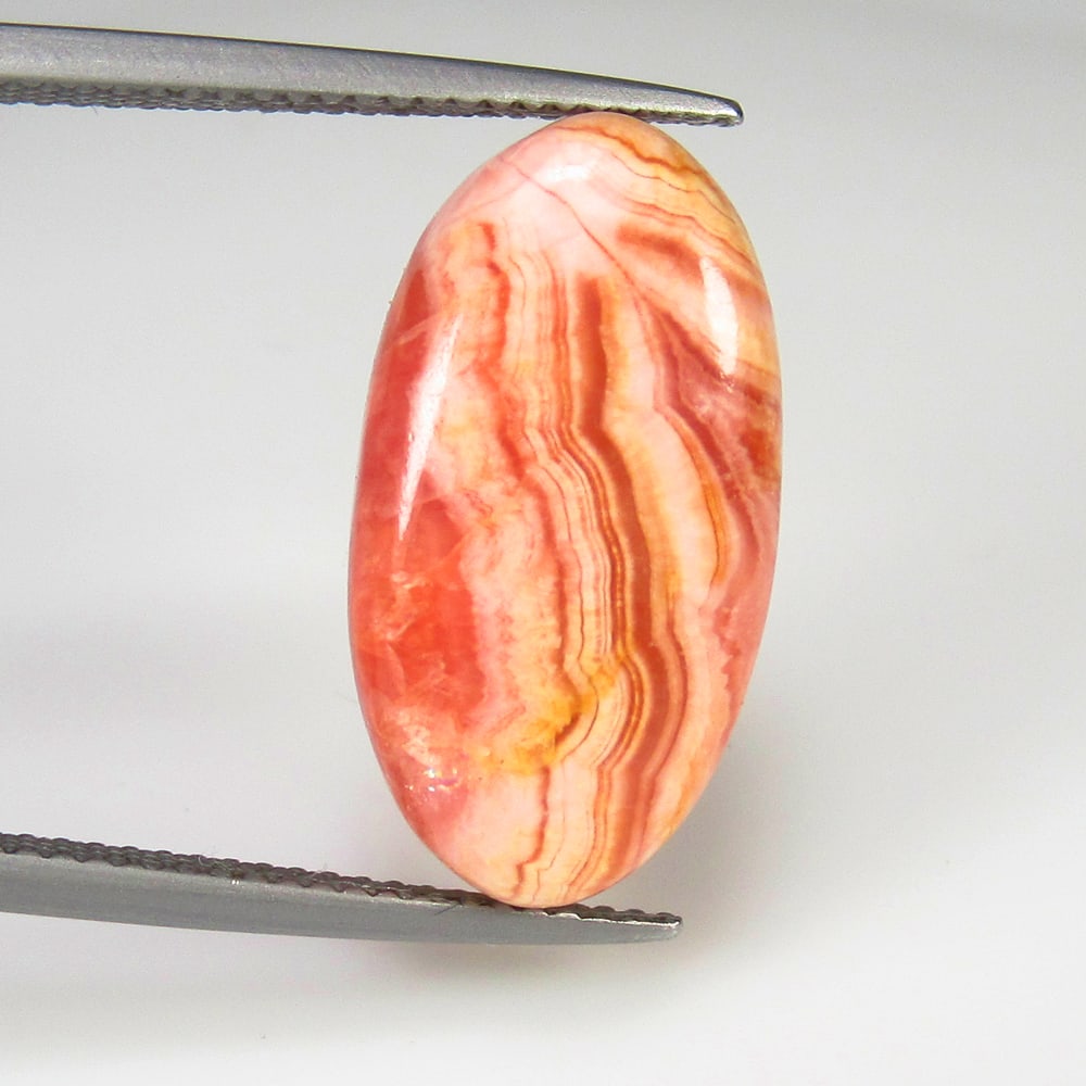 15.28 Ct Natural Pink Rhodochrosite Oval Cab: weight - 15.28 Ct / Size - 22.00 x 10.80 x 5.60 mm / Shape - Excellent Oval Cab / Origin - Brazil / Treatment - None