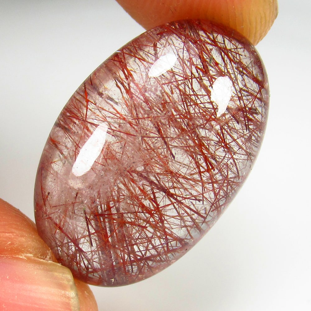 21.98 Ct Natural Brown Hair Rutile Quartz Oval Cab: Weight - 21.98 Ct / Size - 24.00 x 15.30 x 8.70 mm / Shape - Oval Cab / Clarity - Transaprent / Origin - Norway / Treatment - None