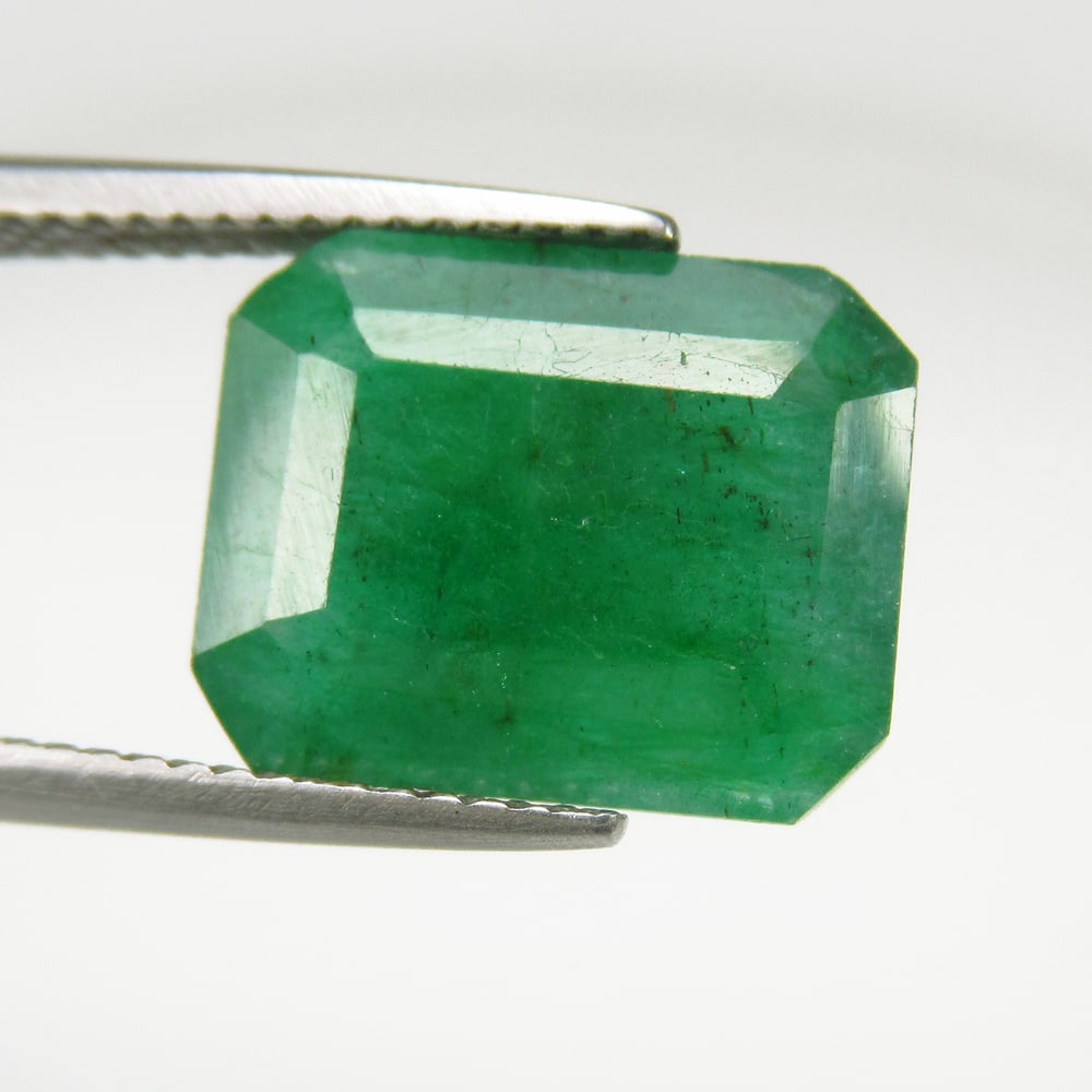 7.76 Ct Natural Green Emerald Octagon Cut: Weight - 7.76 Ct / Size - 13.60 x 11.00 x 7.00 mm / Shape - Octagon Cut / Color - Green / Clarity - SI / Origin - Zambia / Treatment - Color Coated