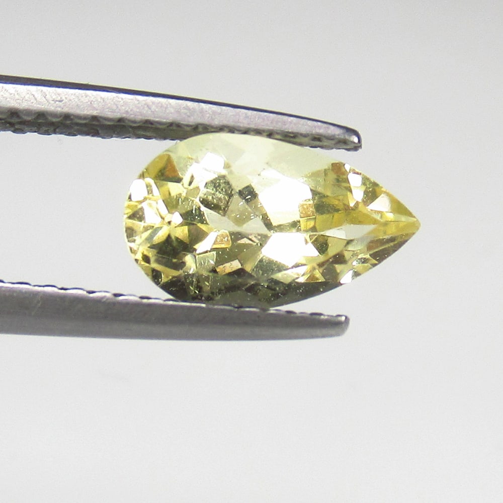 1.56 Ct Natural Yellow Beryl Pear Cut: Weight - 1.56 Ct / Size - 10.00 x 6.10 x 5.00 mm / Shape - Pear Cut / Clarity - Transparent / Origin - Brazil / Treatment - None