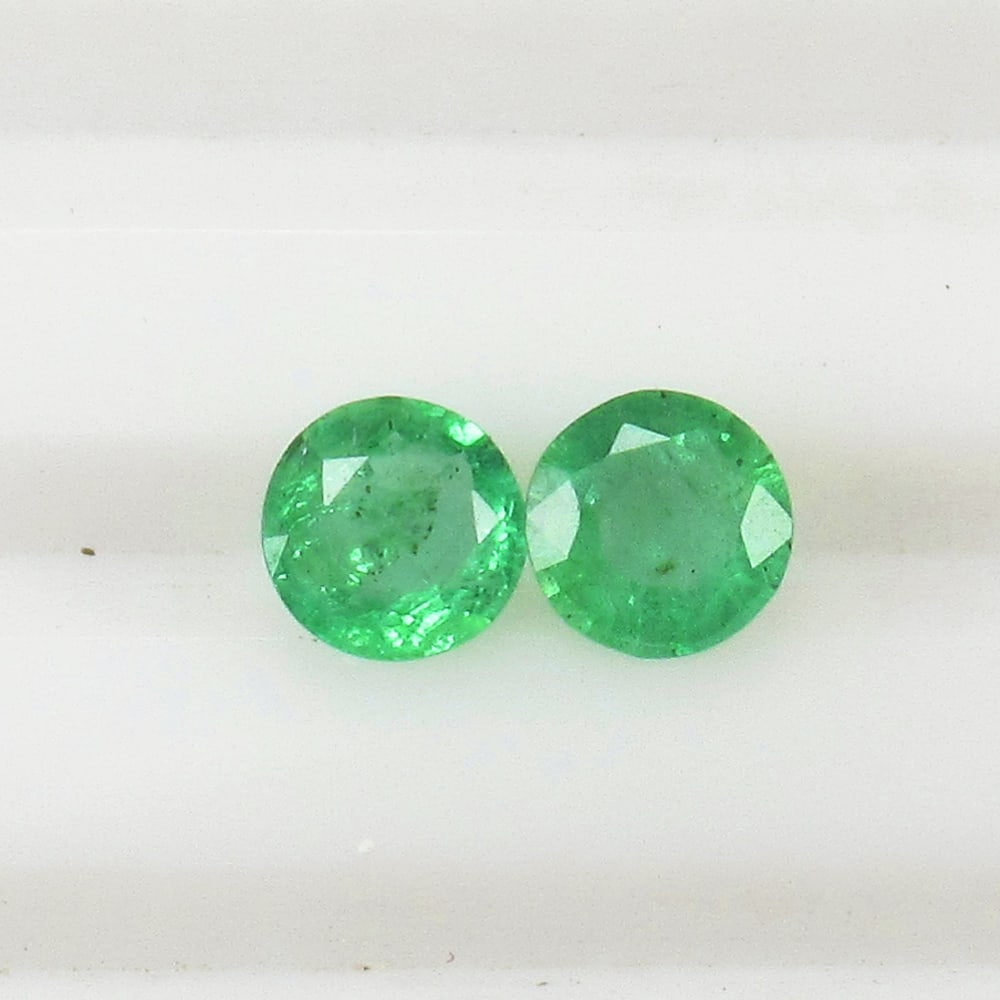 0.71 Ct Natural Zambian Emerald Round Cut Pair (1 of 2)