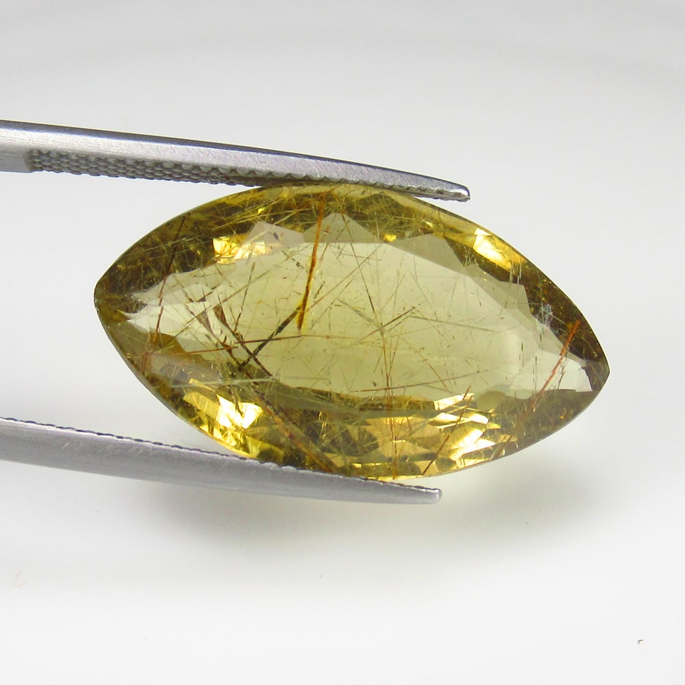16.93 Ct Natural Golden Rutile Quartz Marquise Cut: Weight - 16.93 Ct / Size - 27.00 x 14.00 x 8.60 mm / Shape - Marquise Cut / Clarity - Transparent / Origin - Norway / Treatment - None
