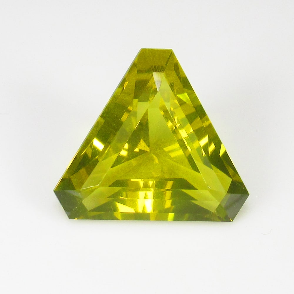 9.33 Ct Natural Lemon Quartz Fancy Trillion Cut: Weight - 9.33 Ct / Size - 14.50 x 14.50 x 8.70 mm / Shape - Fancy Trillion Cut / Clarity - VVS / Origin - Brazil / Treatment - Heated