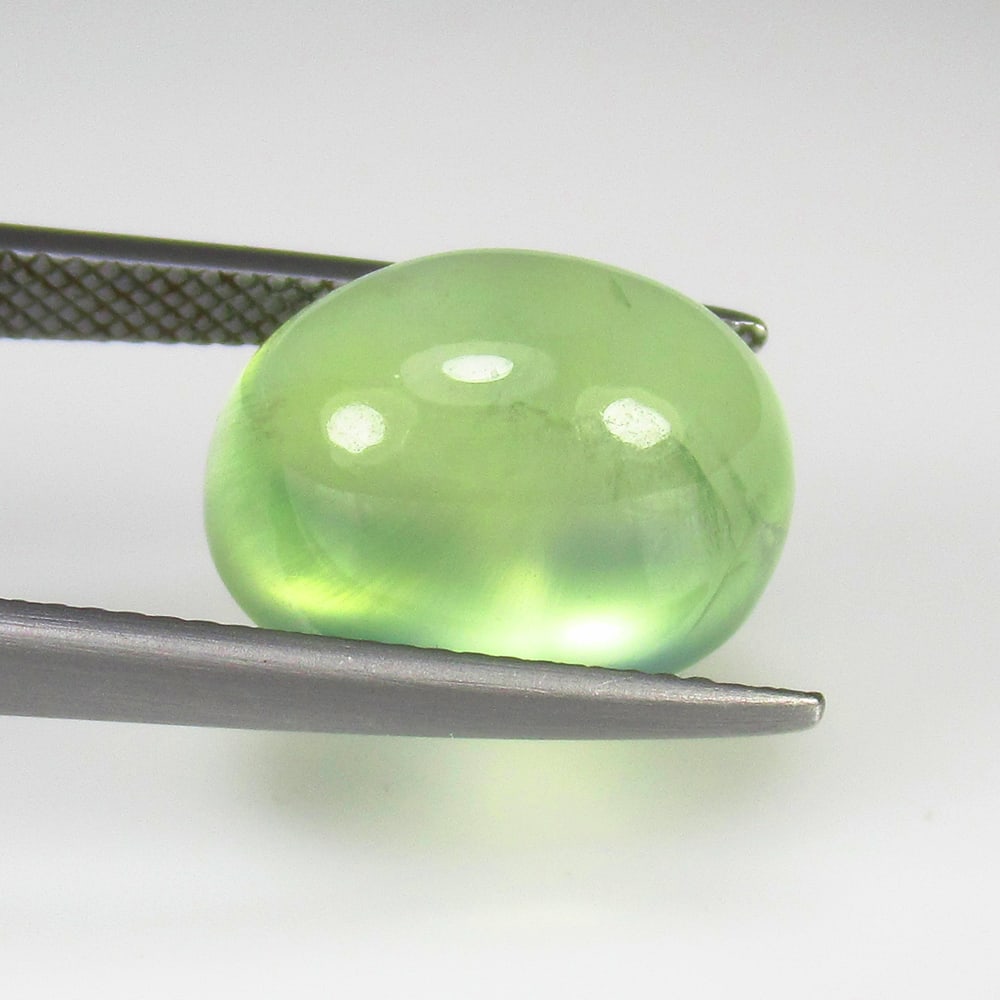 13.10 Ct Natural Fine Green Prehnite Oval Cab: Weight - 13.10 Ct / Size - 15.00 x 11.30 x 9.60 mm / Shape - Oval Cab / Clarity - Semi Transparent / Origin - Brazil / Treatment - None