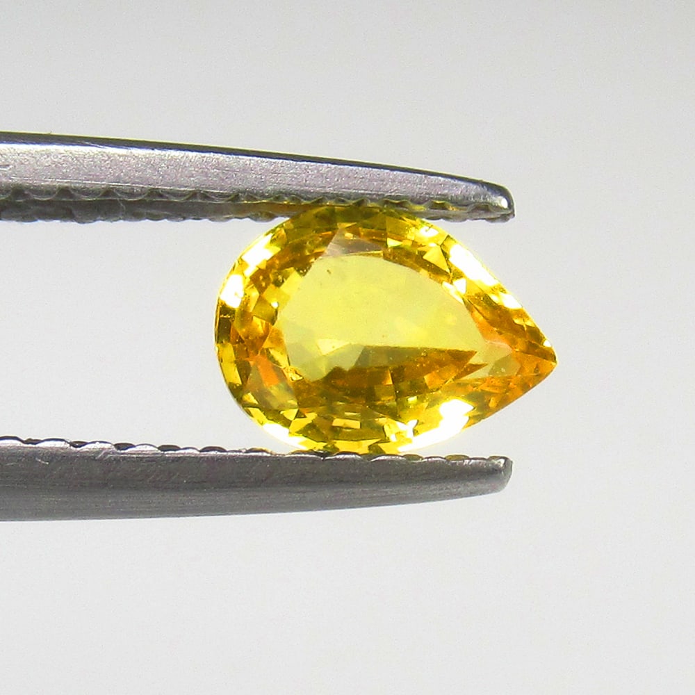 0.86 Ct Natural Yellow Sapphire Pear Cut: Weight - 0.86 Ct / Size- 6.70 x 5.00 x 3.00 mm / Shape - Pear Cut / Clarity - VVS / Origin - Sri Lanka / Treatment - Standard Heated
