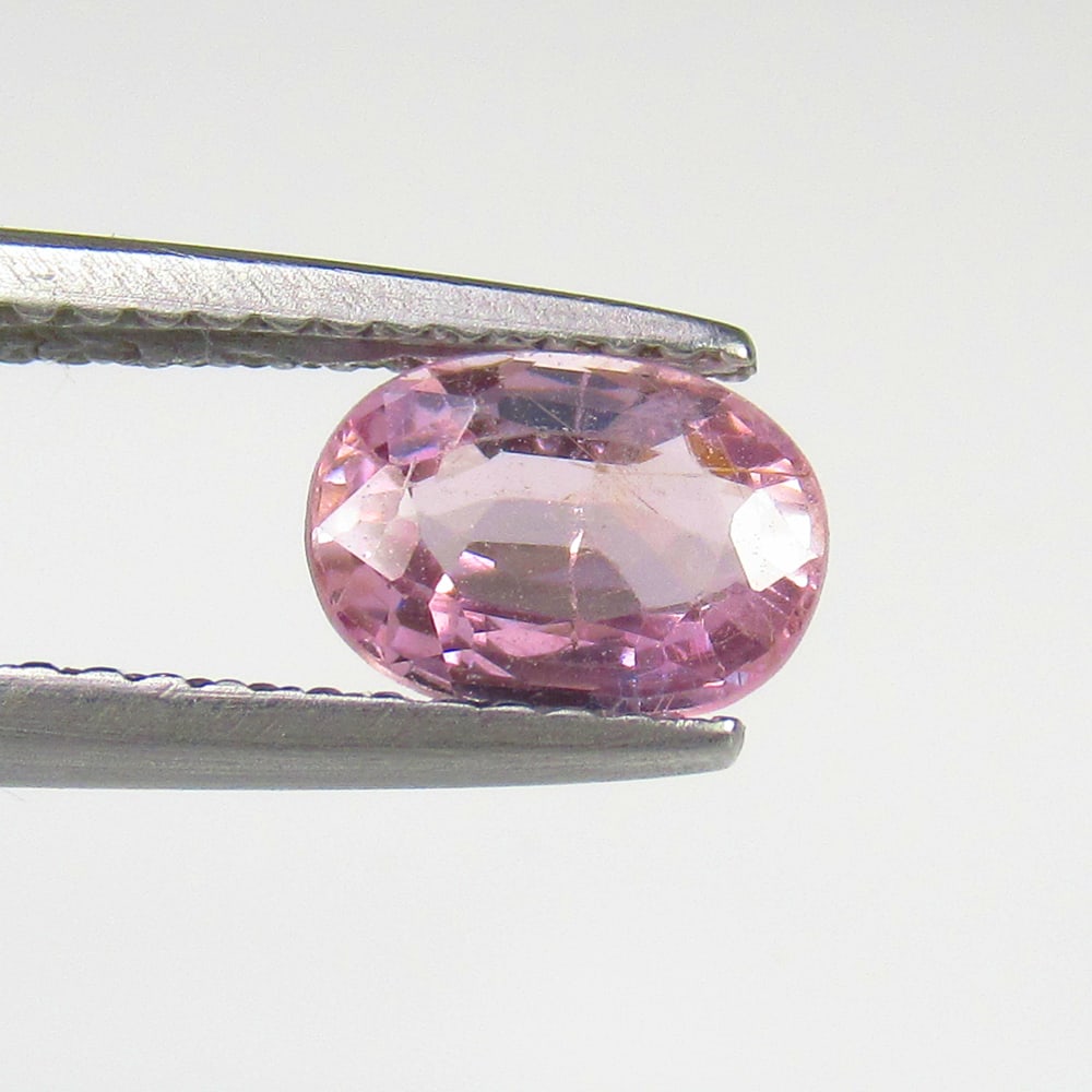 0.95 Ct Natural Pink Spinel Oval Cut: Weight - 0.95 Ct / Size - 7.40 x 5.60 x 3.20 mm / Shape - Oval Cut / Color - Pink / Clarity - SI / Origin - Mozambique / Treatment - None