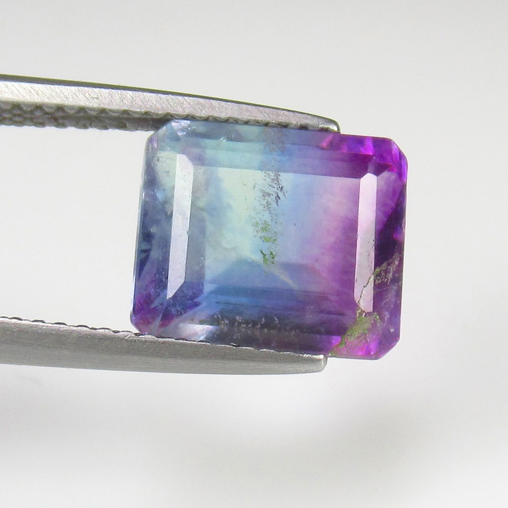 6.50 Ct Natural Multicolor Flourite Octagon Cut: Weight - 6.50 Ct / Size - 11.10 x 9.50 x 7.30 mm / Shape - Octagon Cut / Color - Multicolor / Clarity - VVS / Origin - Brazil / Treatment - None