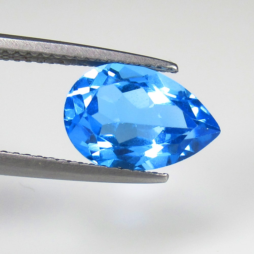 3.73 Ct Natural Blue Topaz Pear Cut: Weight - 3.73 Ct / Size - 12.40 x 8.60 x 5.90 mm / Shape - Pear Cut / Color - Blue / Clarity - VVS / Origin - Brazil / Treatment - Irradiated