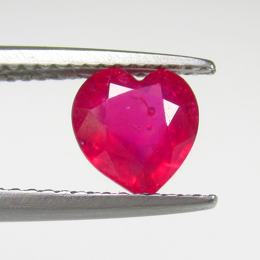 1.49 Ct Natural Pinkish Red Ruby Lovely Heart Cut: Weight - 1.49 Ct / Size -7.50 x 7.20 x 4.00 mm / Shape - Heart Cut / Color - Red / Clarity - SI / Origin - Mozambique / Treatment - Color Enhanced By Glass Filling