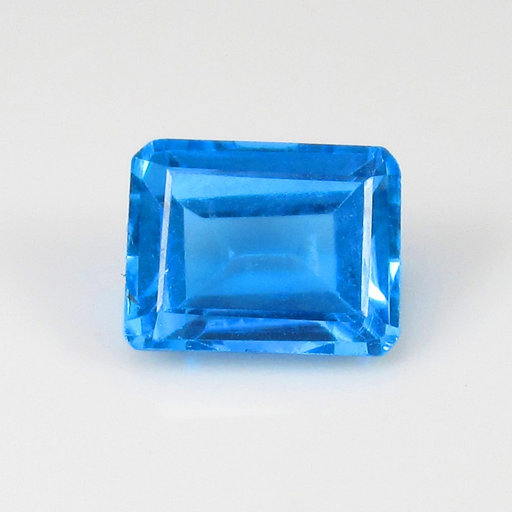 3.25 Ct Natural Blue Topaz Emerald Cut: Weight - 3.25 Ct / Size - 8.80 x 6.80 x 4.50 mm/ Shape - Emerald Cut / Color - Blue / Clarity - VVS / Origin - Brazil / Treatment - Irradiated