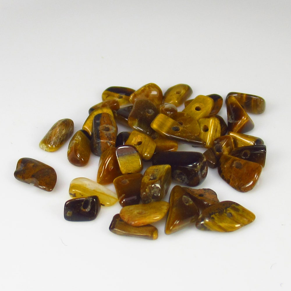 14.18 Ct Natural Tiger's Eye Unshaped Beads: Weight - 14.18 Ct / Size - 4.0x3.5 - 9.1x6.1 mm / 38 PC's / Shape - Drilled Unshaped Beads / Color - Golden Brown / Clarity - Opaque / Origin - Burma / Treatment - None