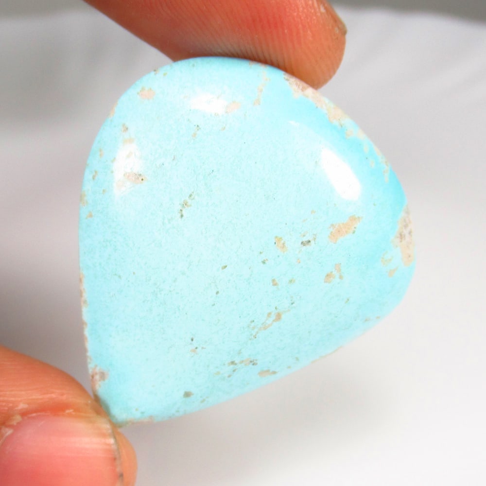 51.75 Ct Natural Earth Mined Blue Turquoise Pear Cab: Weight - 51.75 Ct / Dimensions - 35.00 x 35.00 x 8.00 mm / Good Color / Pear Cabochon - Ready for Jewellery Setting / Origin - Arizona / Comments - None