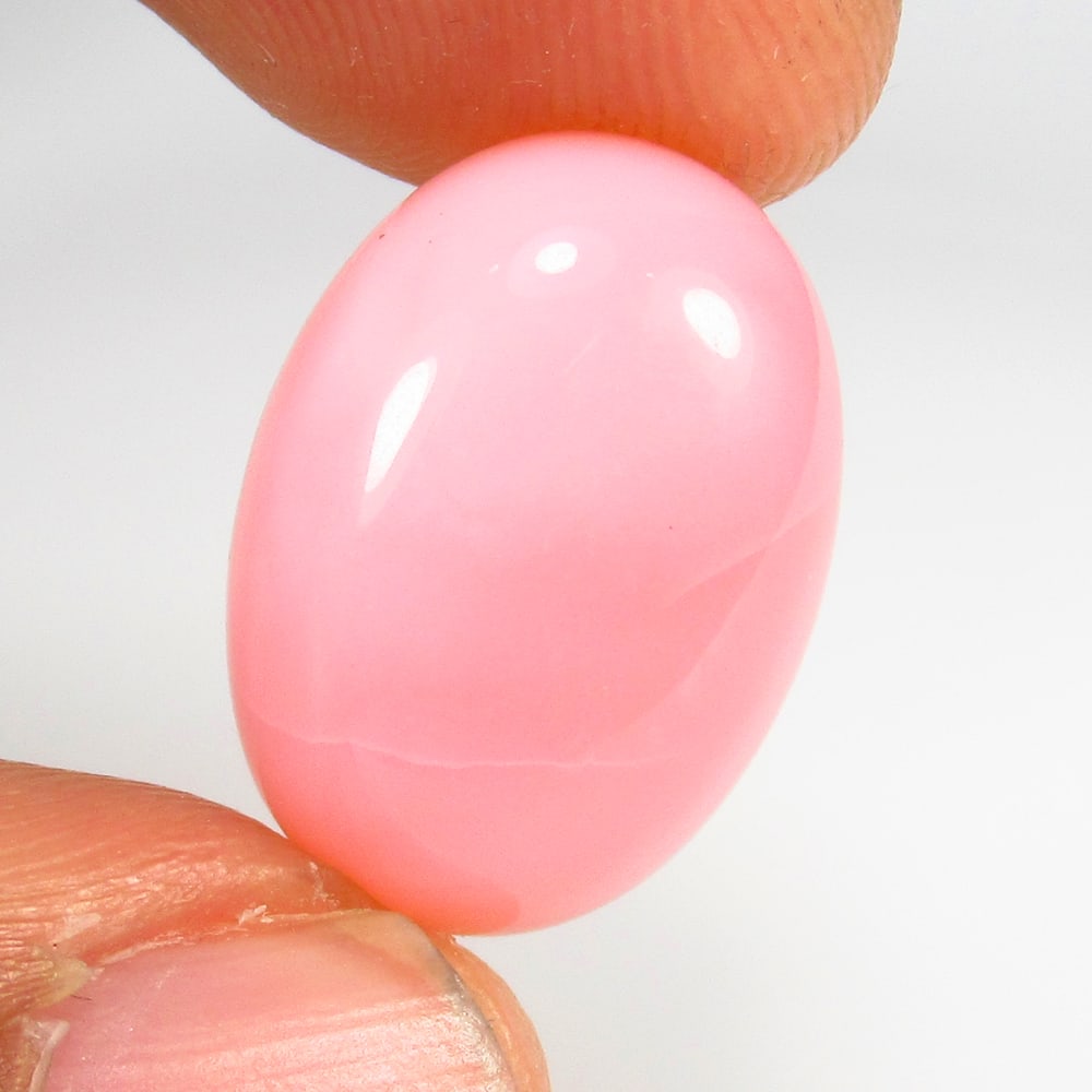 9.86 Ct Natural Pink Opal Oval Cab: Weight - 9.86 Ct / Size - 18.50 x 13.50 x 6.50 mm / Shape - Oval Cabochon / Clarity - Opaque / Origin - Peru / Treatment - None