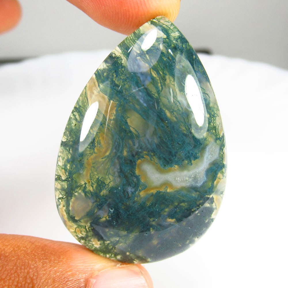 66.90 Ct Natural Moss Agate Pear Cab: Weight - 66.90 Ct / Size - 44.00 x 31.00 x 7.30 mm / Shape - Excellent Pear Cabochon / Clarity - Opaque / Origin - Brazil / Treatment - None