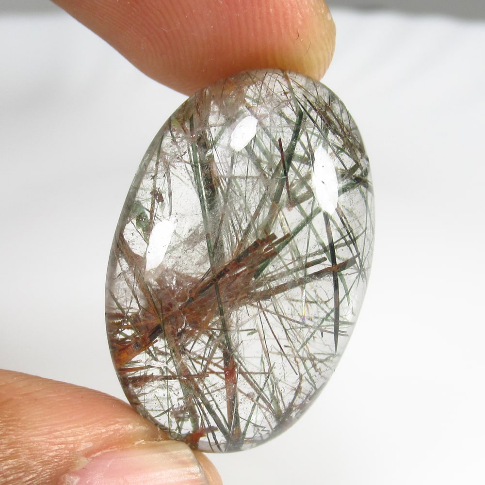 36.24 Ct Natural Black Hair Rutile Quartz Oval Cab: Weight - 36.24 Ct / Size -29.00 x 18.80 x 9.30 mm / Shape - Oval Cab / Clarity - Transparent / Origin - Norway / Treatment - None