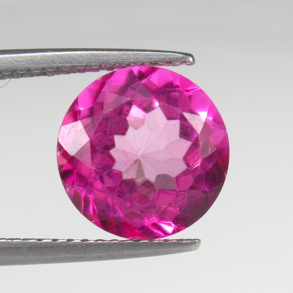 5.17 Ct Natural Pink Topaz Round Cut: Weight - 5.17 Ct / Size - 9.80 x 9.80 x 6.30 mm / Shape - Round Cut / Color - Pink / Clarity - VVS / Origin - Brazil / Treatment - Color Coated