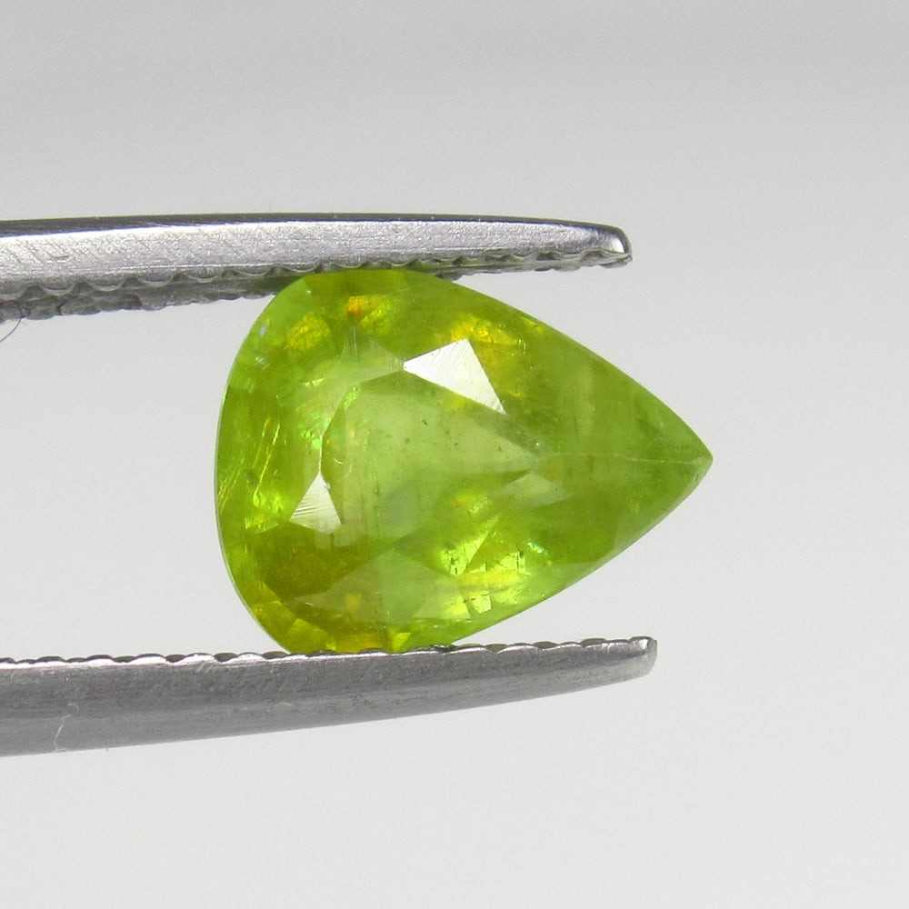 1.58 Ct Natural Sphene Pear Cut: Weight - 1.58 Ct / Size - 9.60 x 8.00 x 4.80 mm / Shape - Pear Cut / Color - Greenish Yellow / Clarity - SI / Origin - Myanmar / Treatment - None