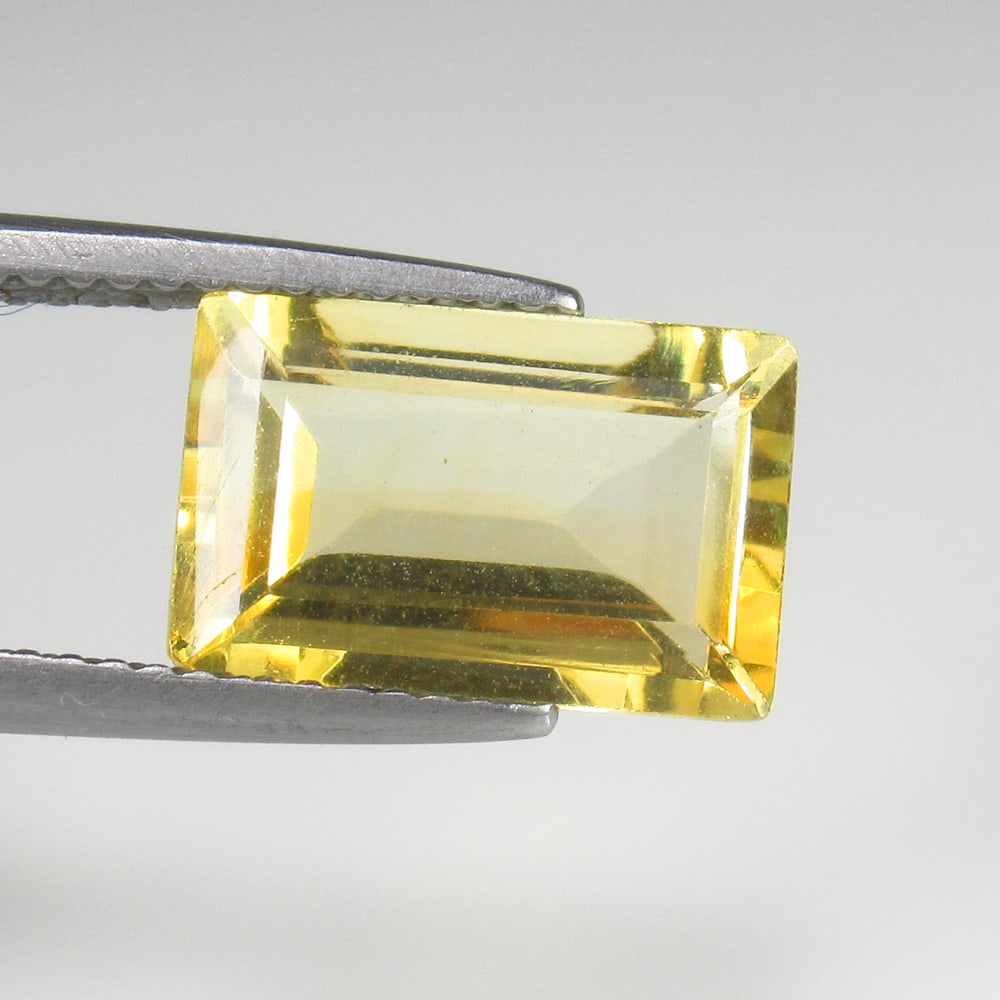 3.75 Ct Natural Yellow Citrine Octagon Cut: Weight - 3.75 Ct / Size - 13.00 x 8.50 x 5.60 mm / Shape - Octagon Cut / Color - Yellow / Clarity - VVS / Origin - Brazil / Treatment - Heated