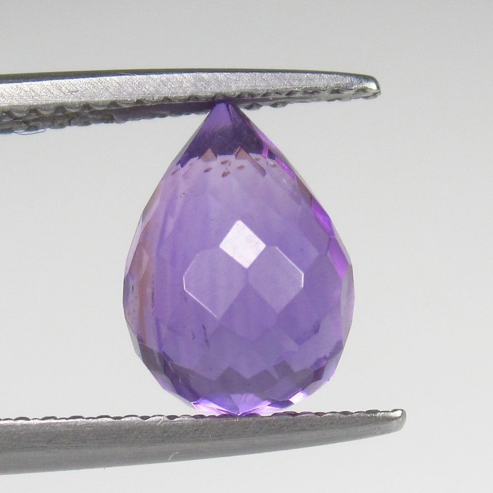 3.42 Ct Natural Purple Amethyst Pear Drop Beads: Weight - 3.42 Ct / Size - 10.30 x 7.50 x 7.50 mm / Shape - Pear Drop Beads / Color - Purple / Clarity - VVS / Origin - Brazil / Treatment - Heated