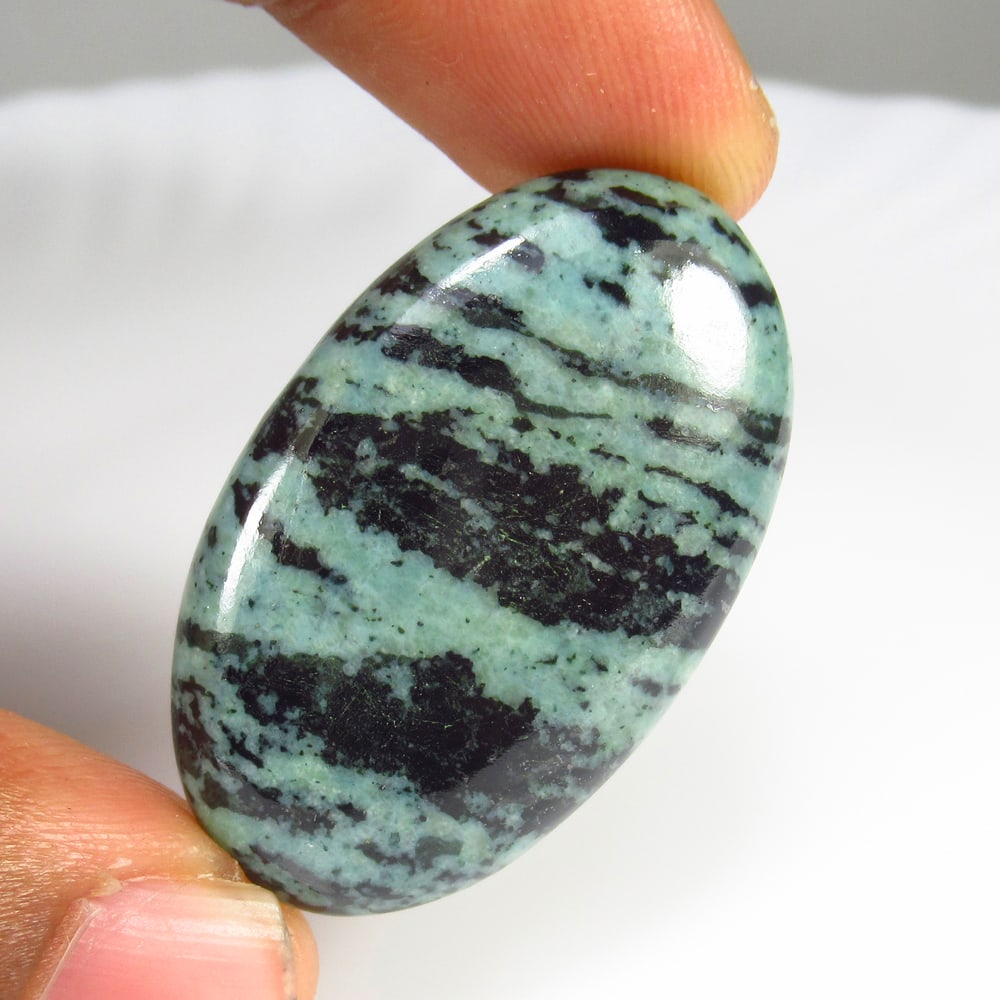 47.40 Ct Natural Ruby Zoisite Oval Cab (1 of 2)