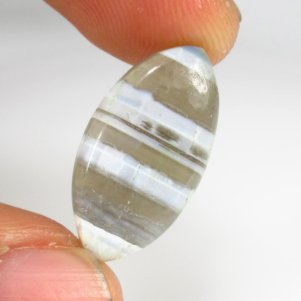 6.46 Ct Natural Banded Agate Marquise Cab: Weight - 6.46 Ct / Size - 24.00 x 12.20 x 3.80 mm / Shape - Marquise Cab / Color - Multicolor / Clarity - OPaque / Origin -Brazil / Treatment - None