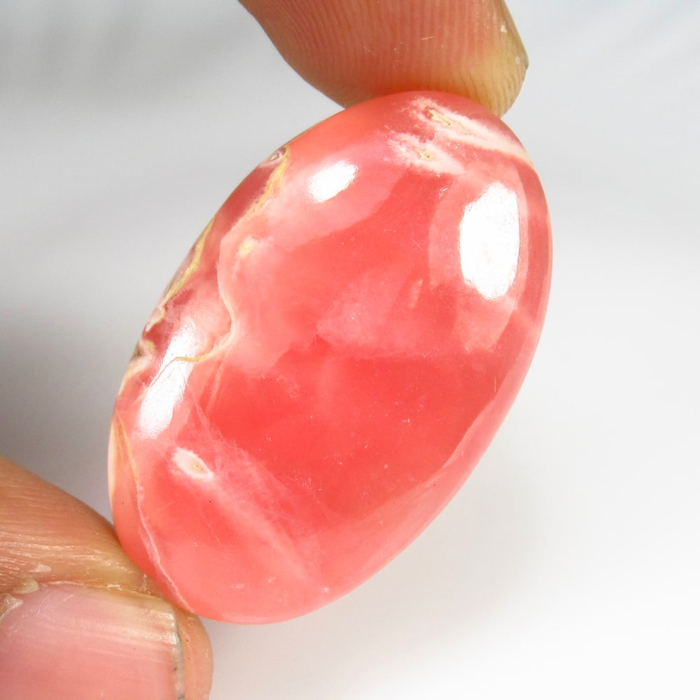 43.19 Ct Natural Pink Rhodochrosite Oval Cab: weight - 43.19 Ct / Size - 35.00 x 20.50 x 6.00 mm / Shape - Excellent Oval Cab / Origin - Brazil / Treatment - None