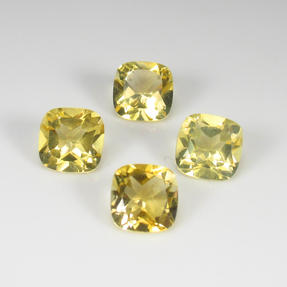 5.53 Ct Natural Citrine Cushion Cut Set: Weight - 5.53 Ct / Size - 7.10 x 7.10 mm / 4 Pc's / Shape - Cushion Cut / Color - Yellow Color / Clarity - VVS / Origin - Brazil / Treatment - Heated