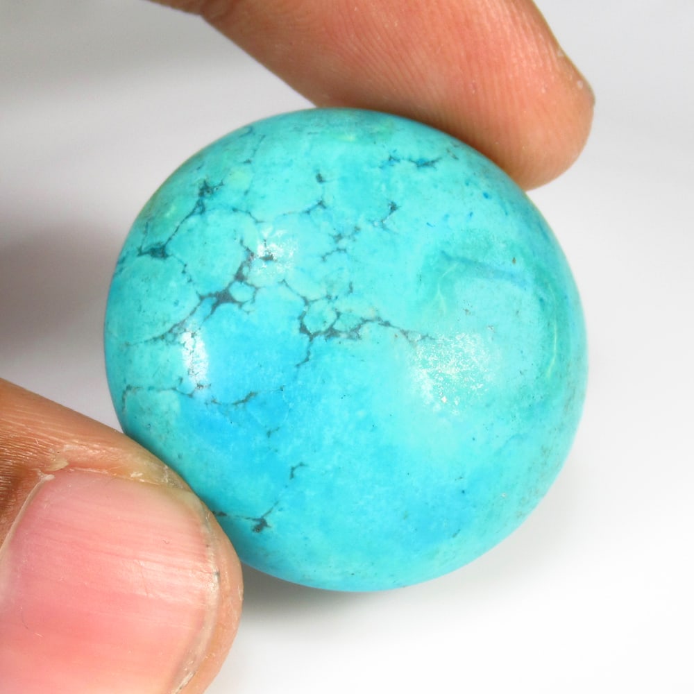 52.42 Ct Natural Blue Turquoise Round Cab: Weight - 52.42 Ct / Dimensions - 30.00 x 30.00 x 8.50 mm / Good Color / Round Cab - Ready for Jewellery Setting / Origin - Arizona / Comments - None