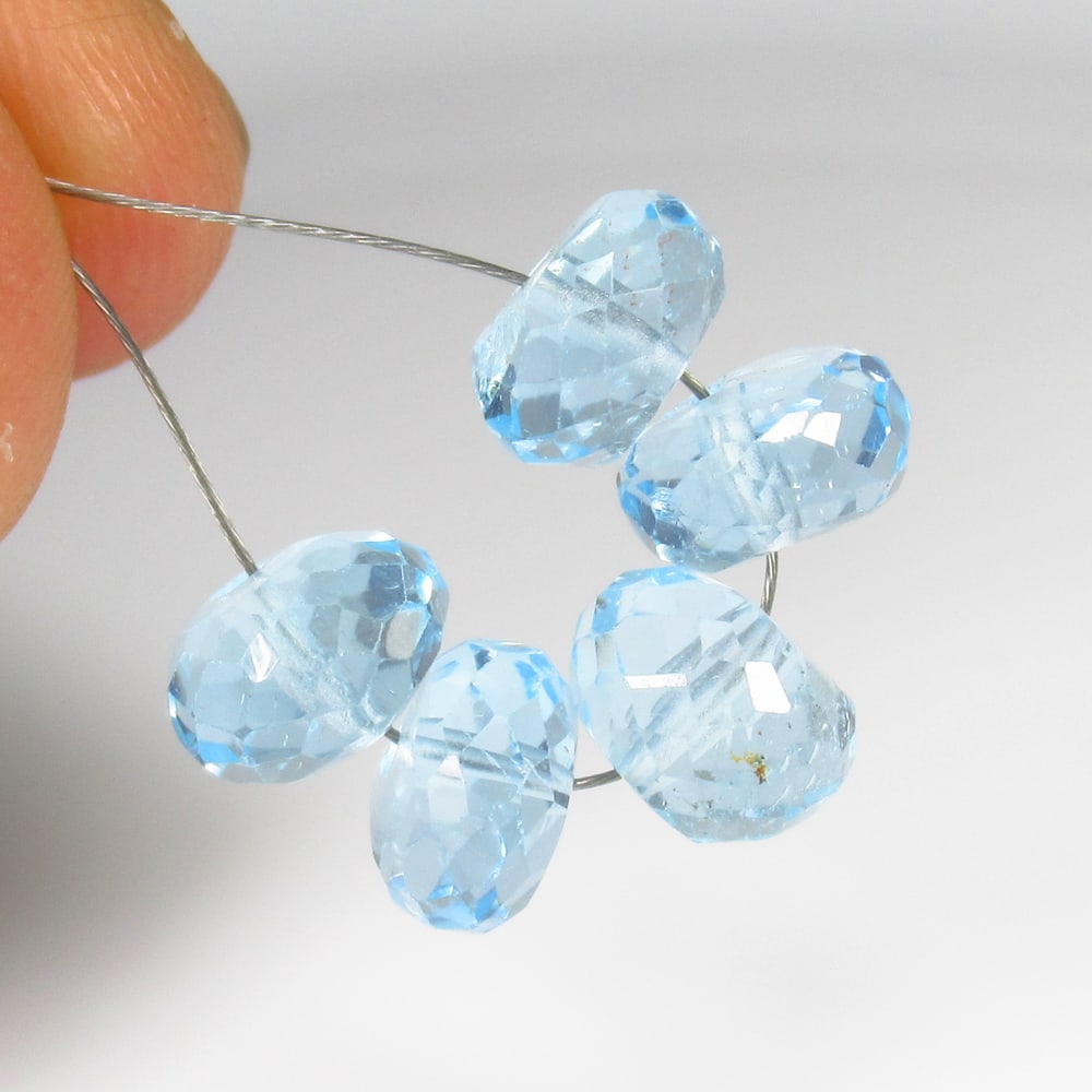 16.70 Ct Natural Blue Topaz Round Cut Beads: Weight - 16.70 Ct / Size - 7.90 - 8.30 mm / 5 Pc's / Shape - Round Cut Beads / Color - Blue / Clarity - VVS / Origin - Brazil / Treatment - Irradiated