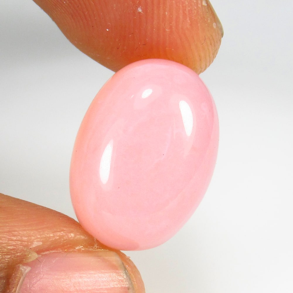 11.03 Ct Natural Pink Opal Oval Cab: Weight - 11.03 Ct / Size -18.10 x 13.10 x 7.10 mm / Shape - Oval Cabochon / Clarity - Opaque / Origin - Peru / Treatment - None
