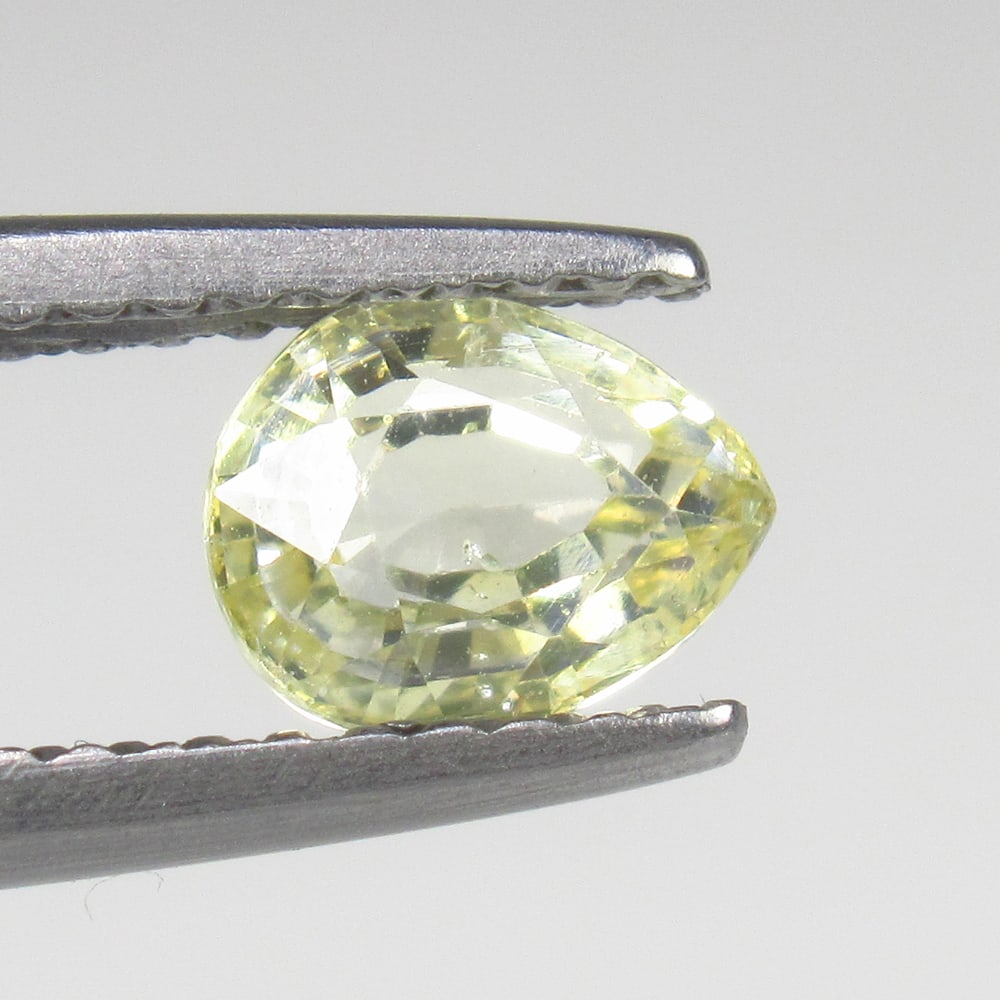 0.90 Ct Natural Yellow Sapphire Pear Cut: Weight - 0.90 Ct / Size- 6.70 x 4.80 x 3.30 mm / Shape - Pear Cut / Clarity - VVS / Origin - Sri Lanka / Treatment - Unheated